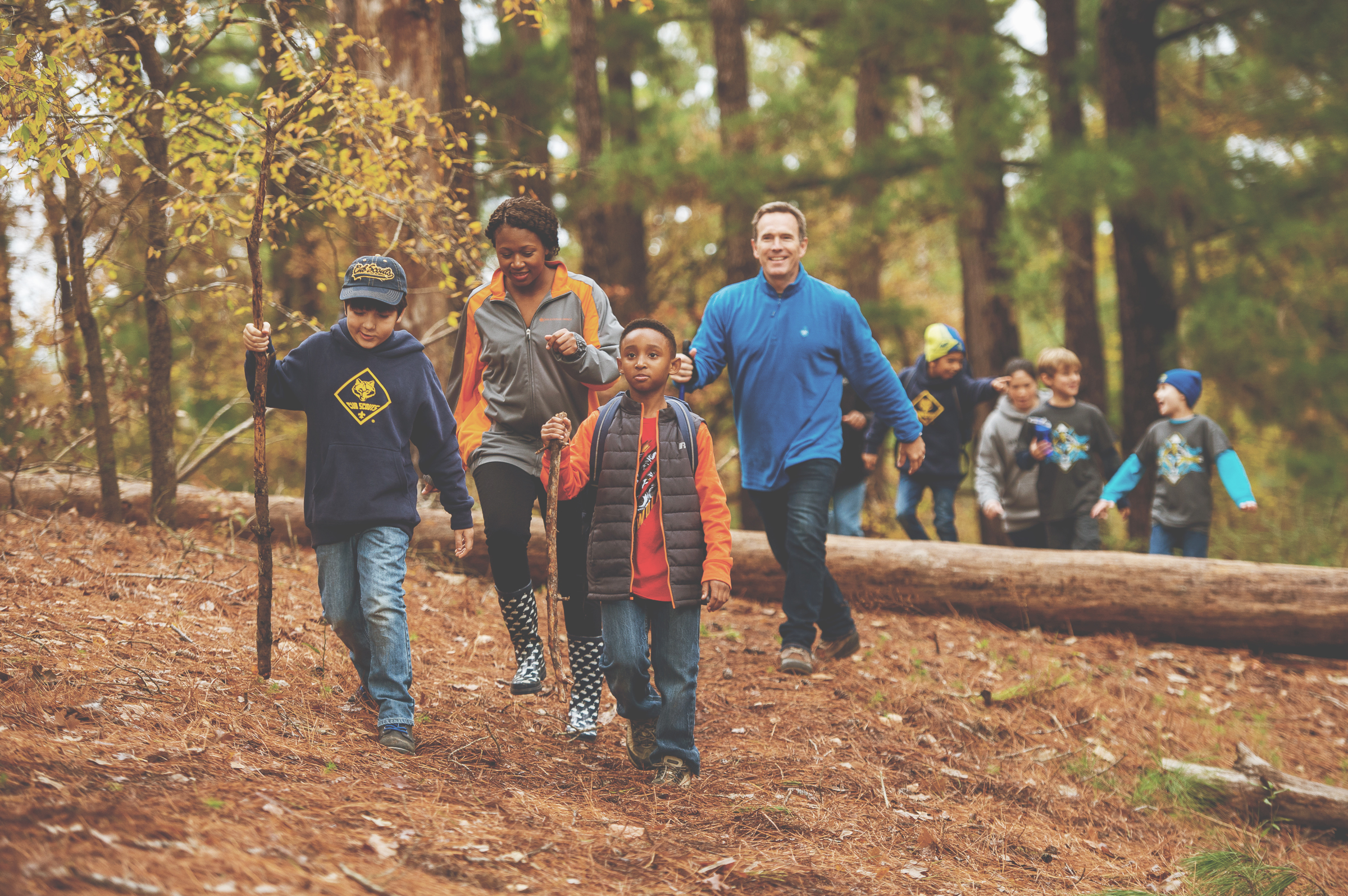 A group of adults hiking outdoors